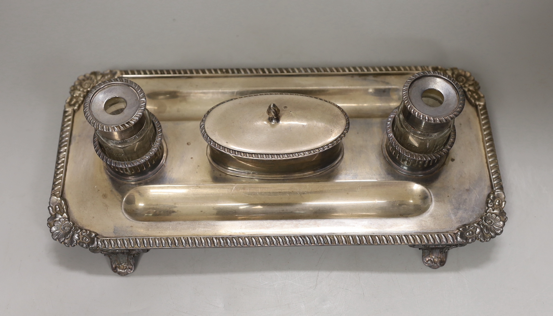 A Regency silver plated inkstand, 29cm wide, 9cm high